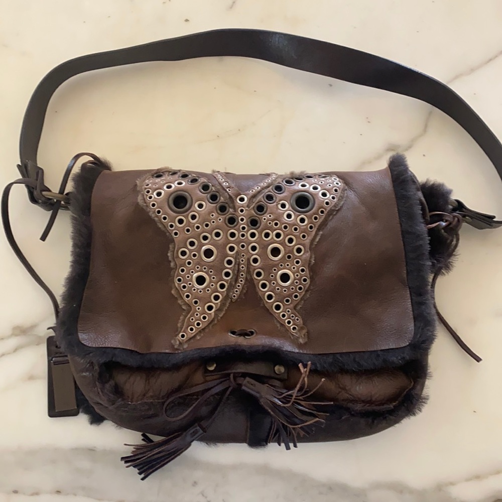 Vintage gently used brown suede Dolce and Gabbana Butterfly Messenger Bag.